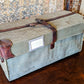 trunk canvas; leather corners & straps