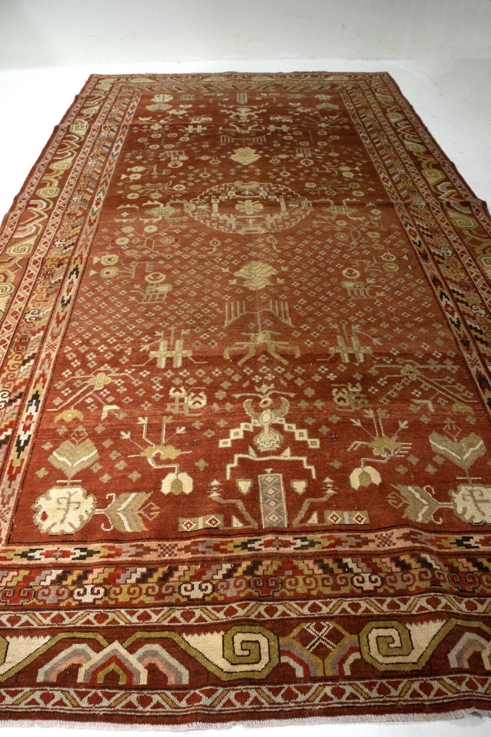 Antique Oriental Khotan Rug