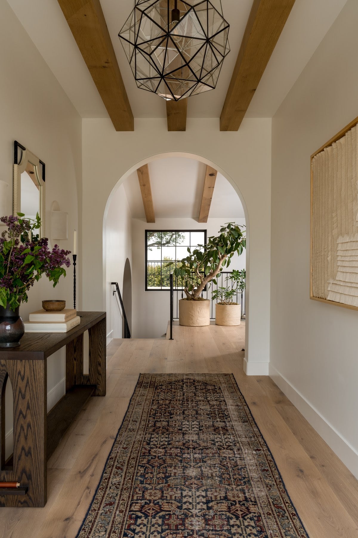 Rug in a warm, sunlit hallway — Charlotte Lea Photography