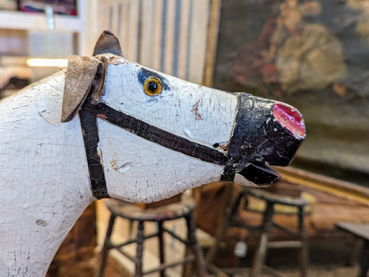 horse on steel stand, glass eyes, Swad ears, felt around seating. Real Heir tail.