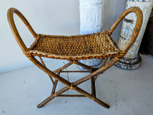 Cane stool with braided straps and palm wood stretchers