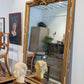 Gilded mirror, rectangular large top applique.